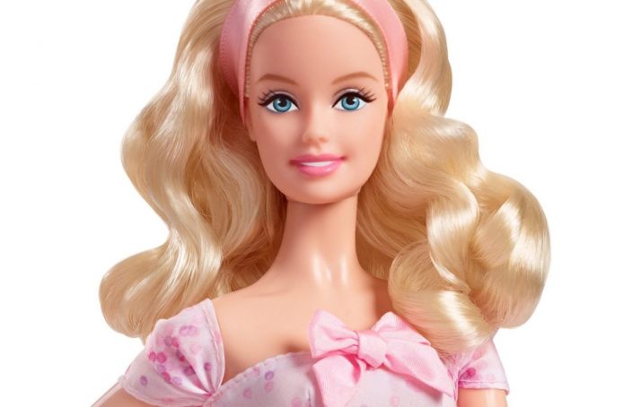 head shot of a blonde barbie doll