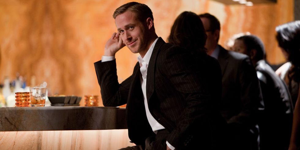 ryan gossling in crazy stupid love leaning on a bar 