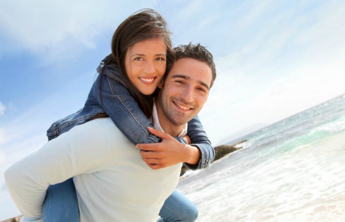 man and woman on beach