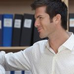 man and woman flirting in library