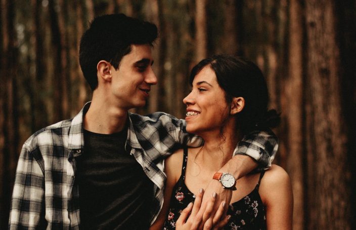 man and woman embracing